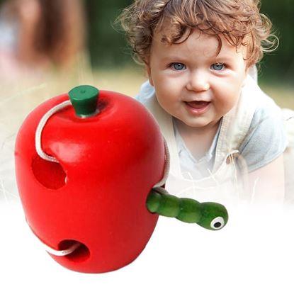 Obraz Drewniana zabawka - robak w jabłku