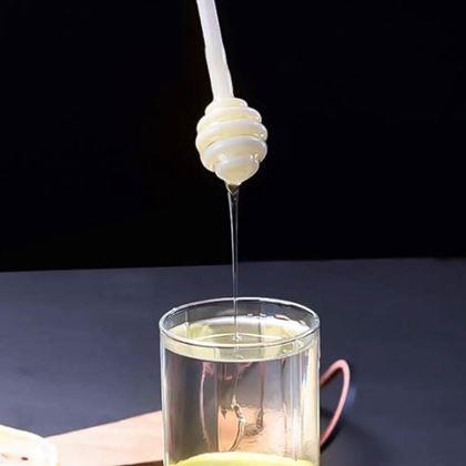 Obrazek z Szklany słoik z łyżką do miodu