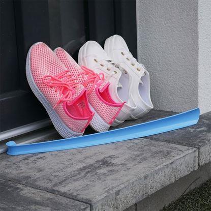 Obraz Plastikowa łyżka do butów