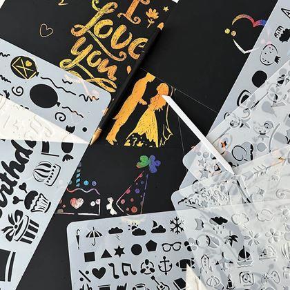 Obrazek z 5 szt. szablonów do wyskrobywania A4 + 2 długopisy