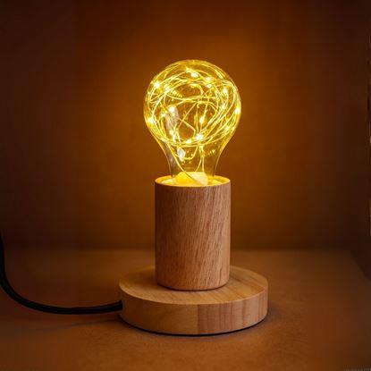 Obraz Drewniana lampa stołowa z żarówką 