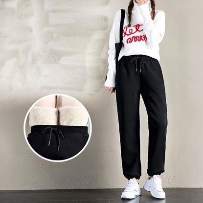 Obraz Damskie spodnie dresowe z futerkiem 
