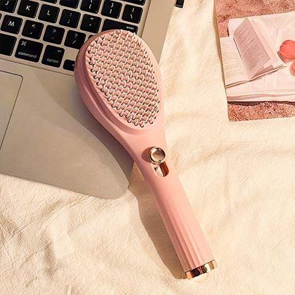 Obrazek z Samooczyszczająca się szczotka do włosów