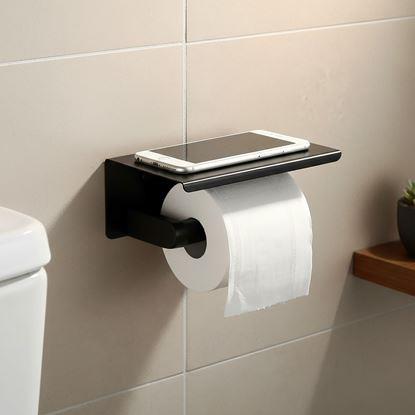 Obraz Metalowy uchwyt na papier toaletowy z półką na odłożenie