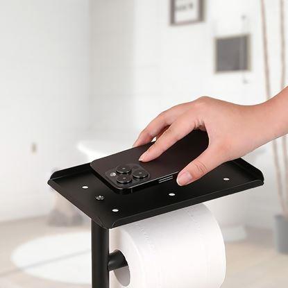 Obraz Metalowy czarny stojak na papier toaletowy z szczotką do WC