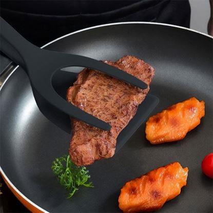 Obraz Plastikowa łopatka i szczypce 2w1